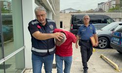 Tramvayda kadını gizlice çekti, meydan dayağı yedi!