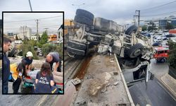 Tır 12 metrelik viyadükte asılı kaldı: İzmir İtfaiyesi'nden nefes kesen kurtarma