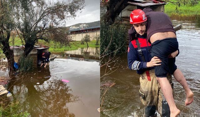 İzmir’de selde mahsur kaldı, itfaiye eri sırtında kurtardı!