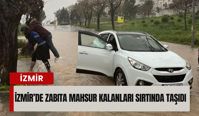 Turuncu alarmda İzmir’de seferberlik: Zabıta mahsur kalanları sırtında taşıdı