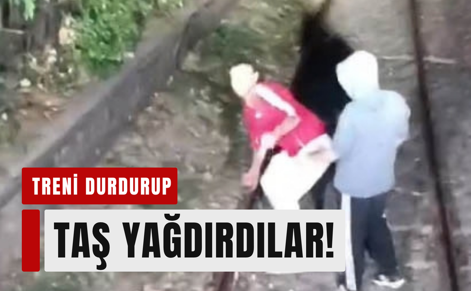Alsancak’ta raylara çıktılar, trene taş attılar!