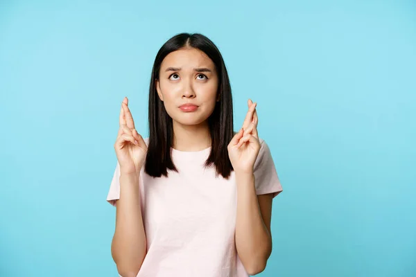 Depositphotos 521885422 Stock Photo Worried Asian Girl Looking Up
