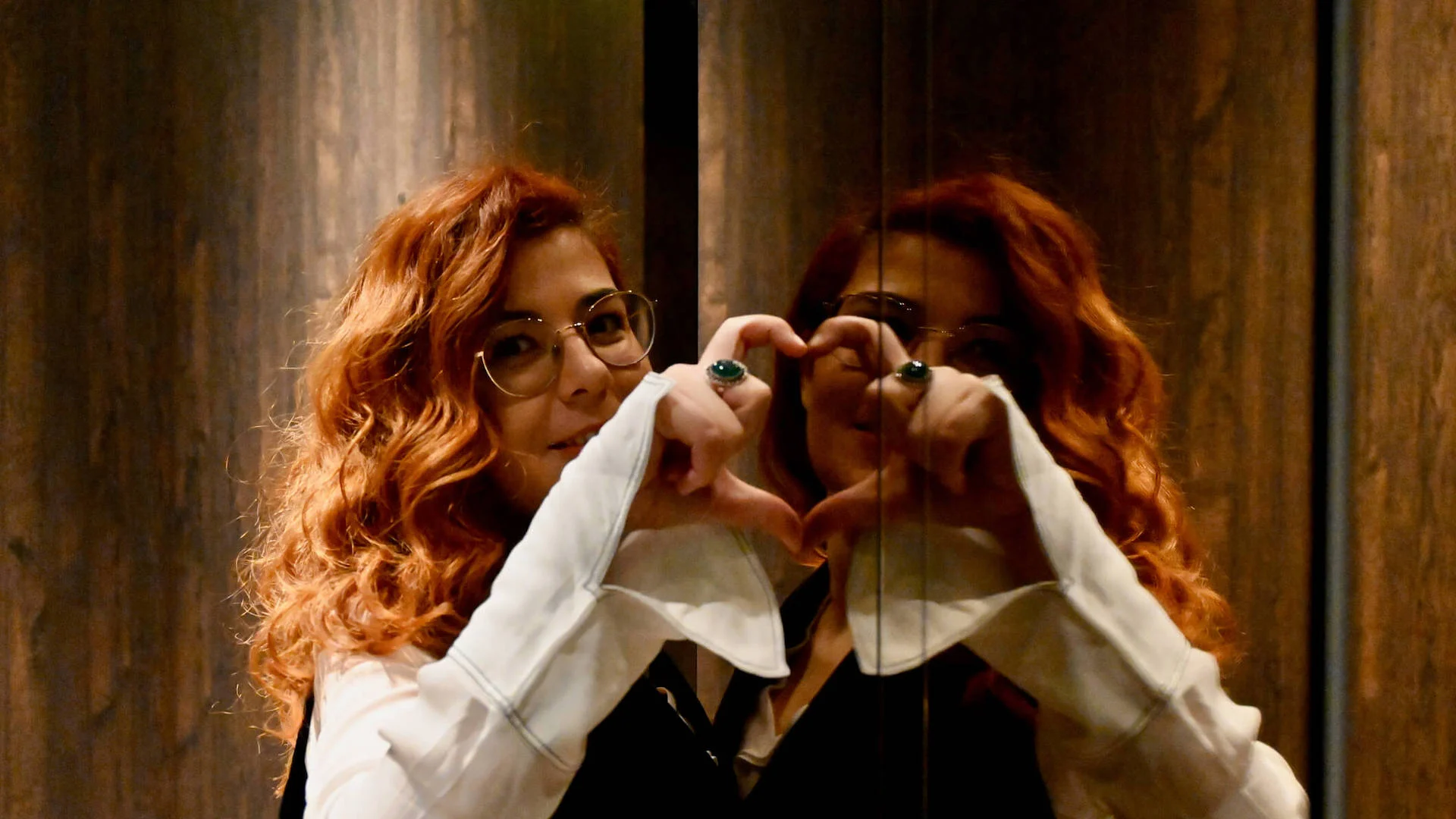 Self Love Person Makes Heart With Hands In Mirror